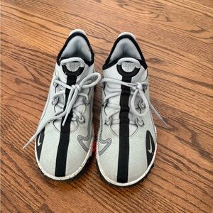 Nike Kids Sneakers in Light Gray and Black with Red Details